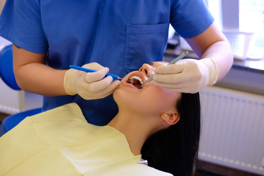 Patient receiving a dental implant procedure at West Brickell Dental in Miami.